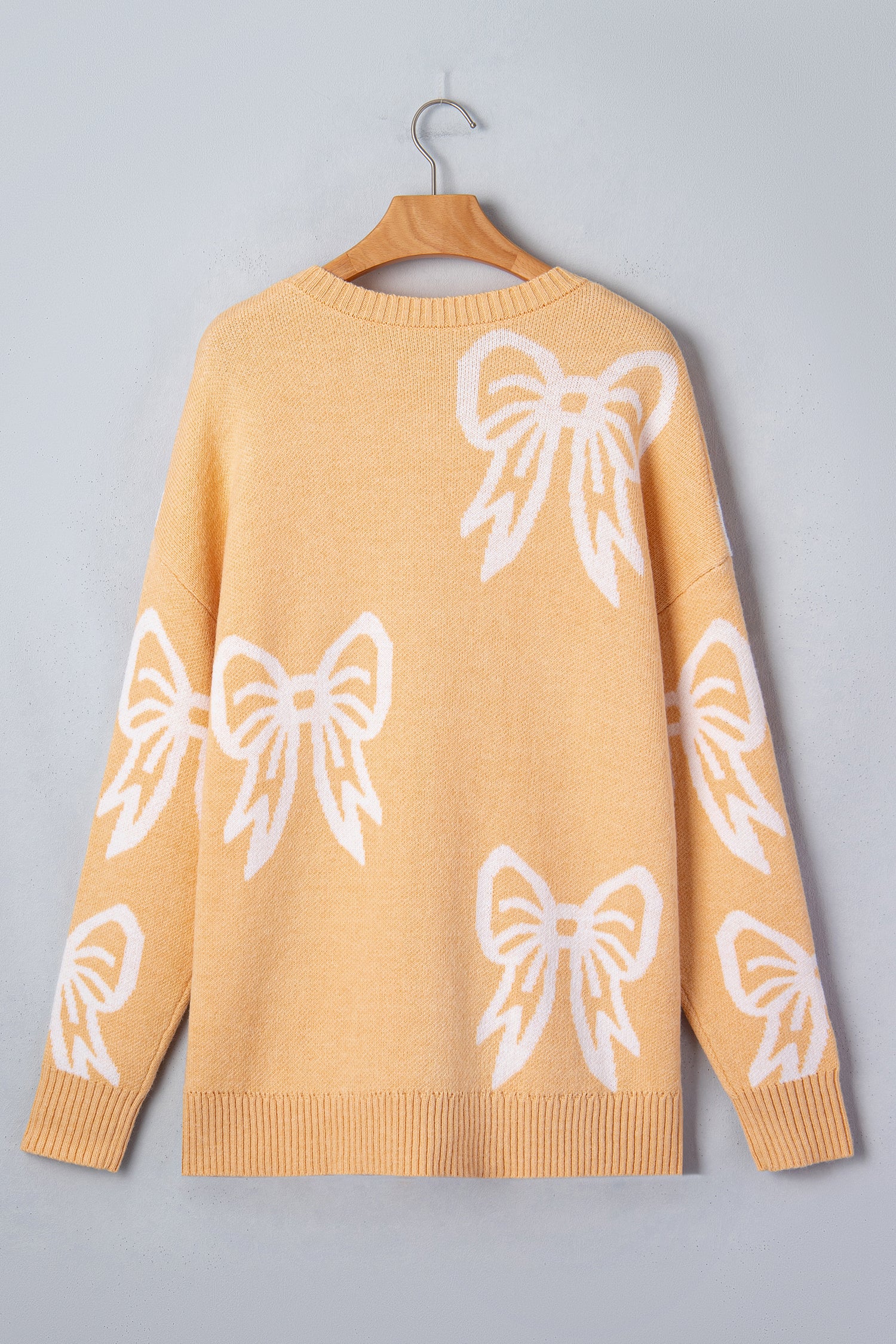 Golden Fleece Bow Pattern Drop Shoulder Loose Sweater