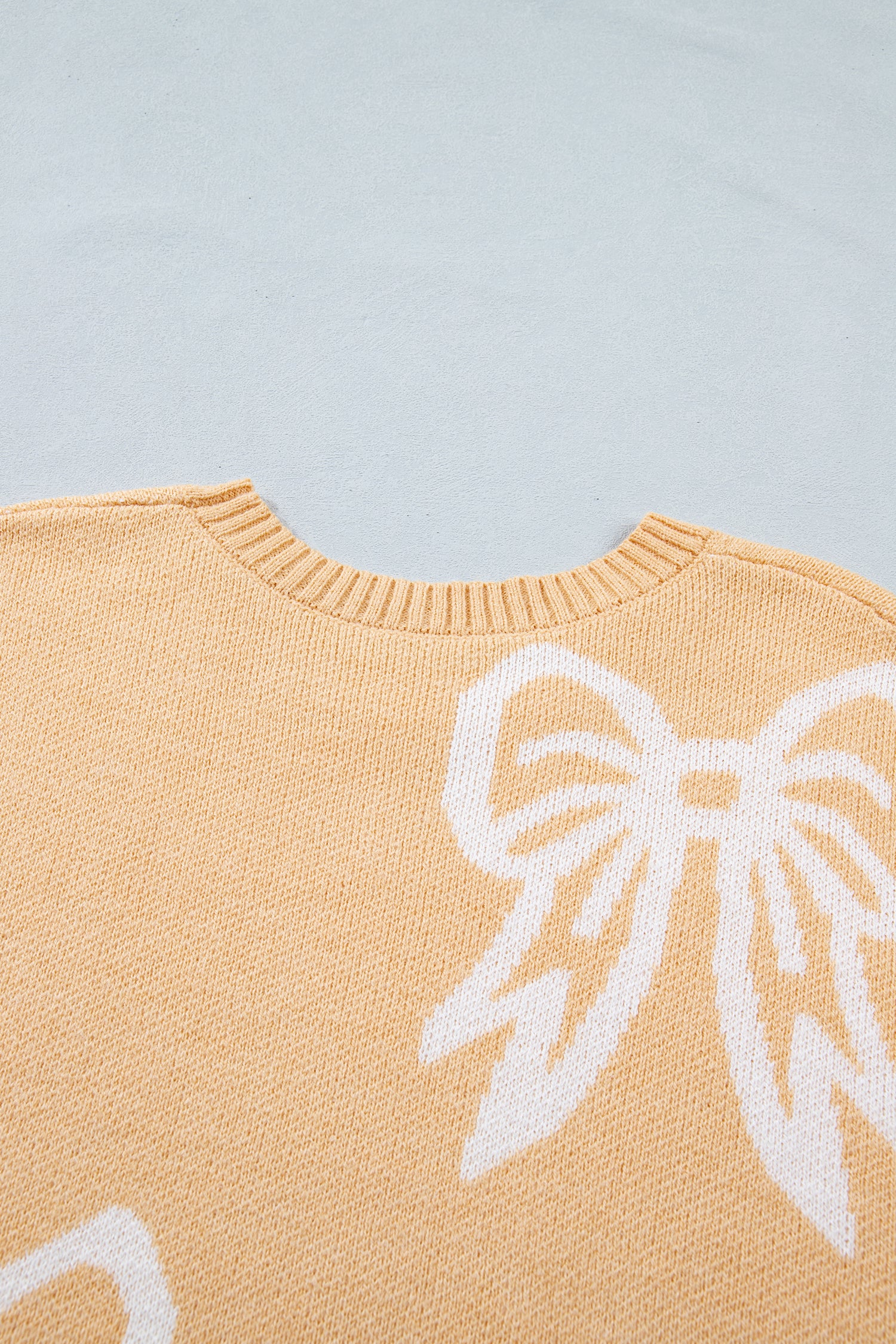 Golden Fleece Bow Pattern Drop Shoulder Loose Sweater